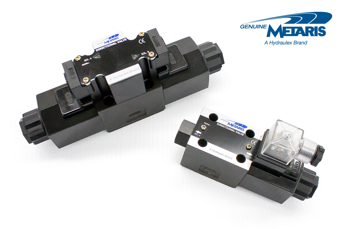 Black painted Metaris brand DSG-01 Series Solenoid Operated Directional Valves on white background.
